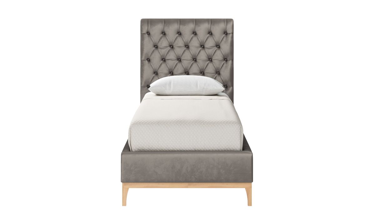 Single bed with upholstered outlet headboard