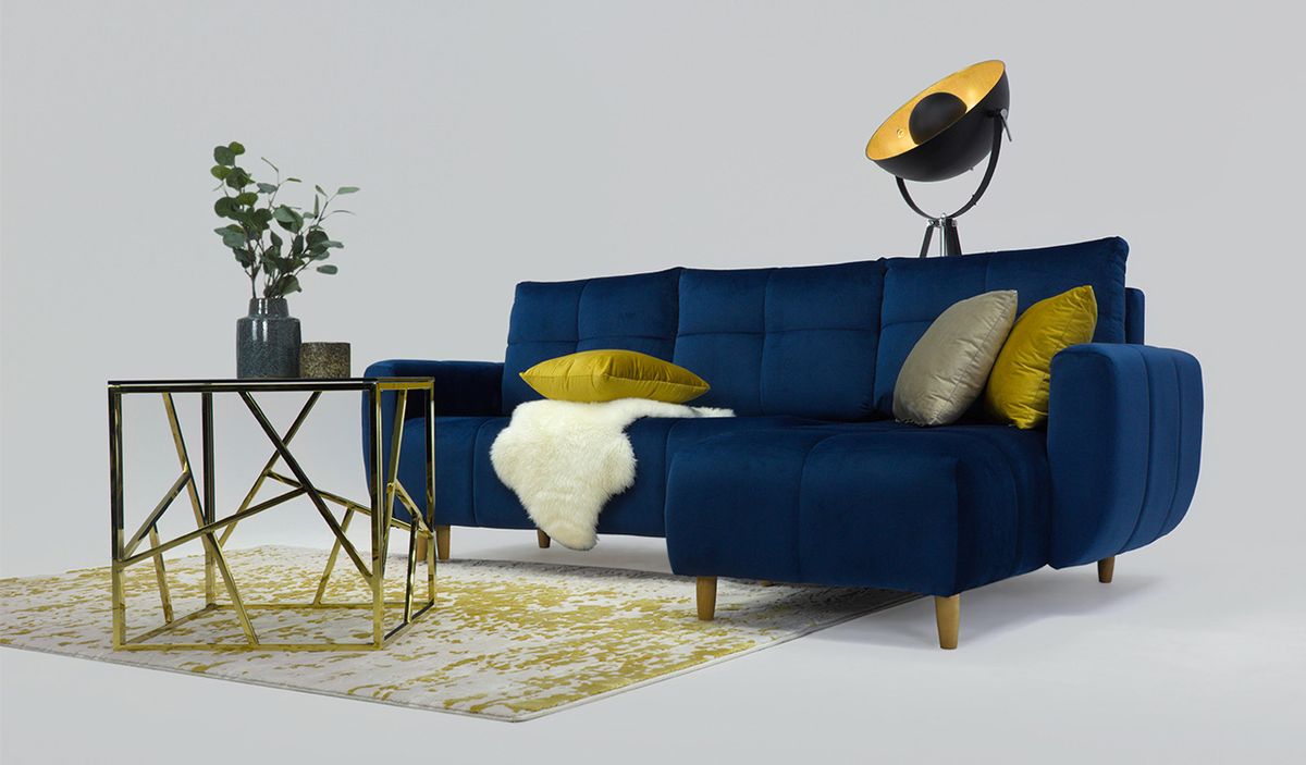 Navy blue sofa with store gold legs